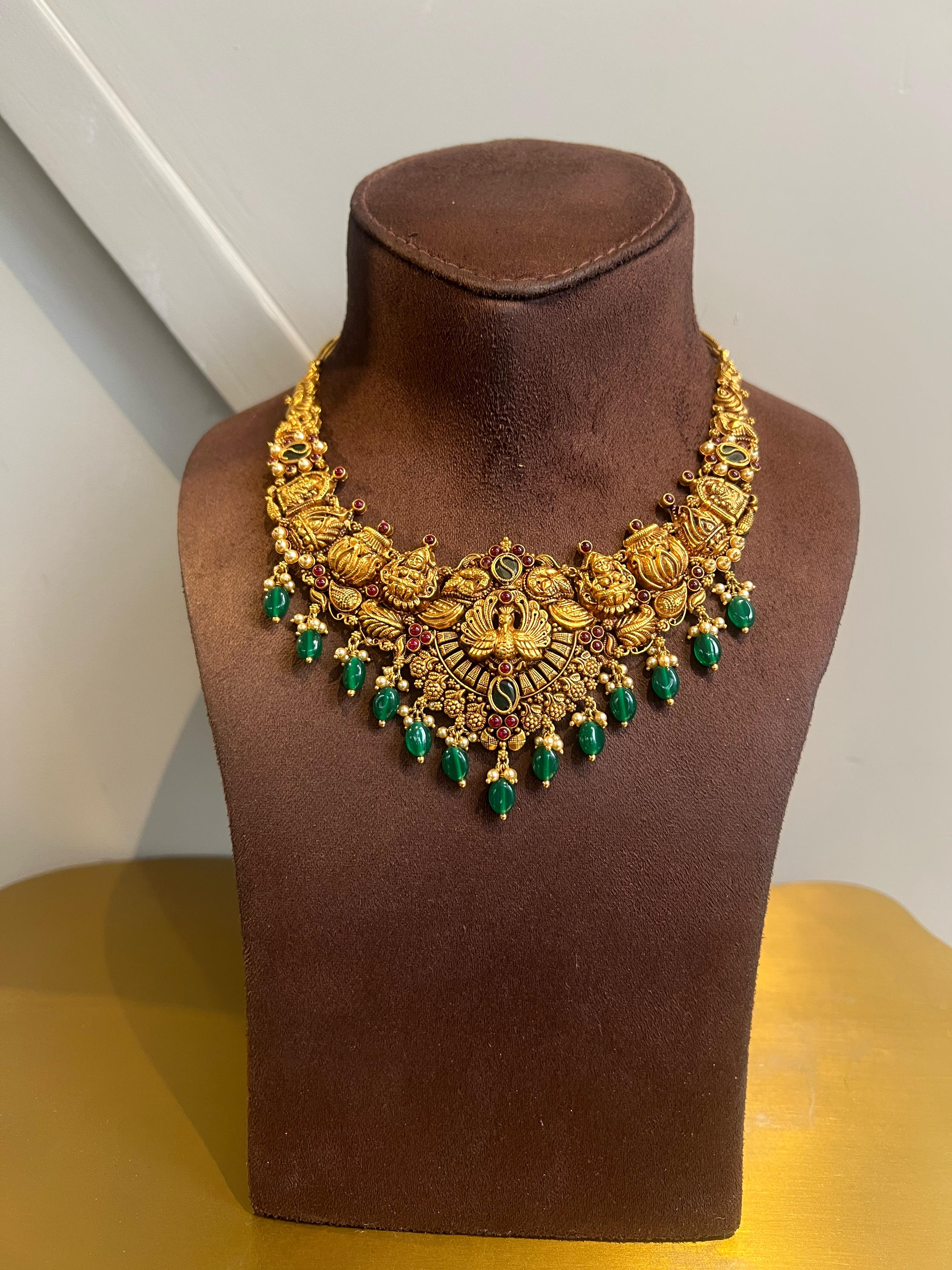 Antique gold necklace with peacocks Antique gold necklace with peacocks