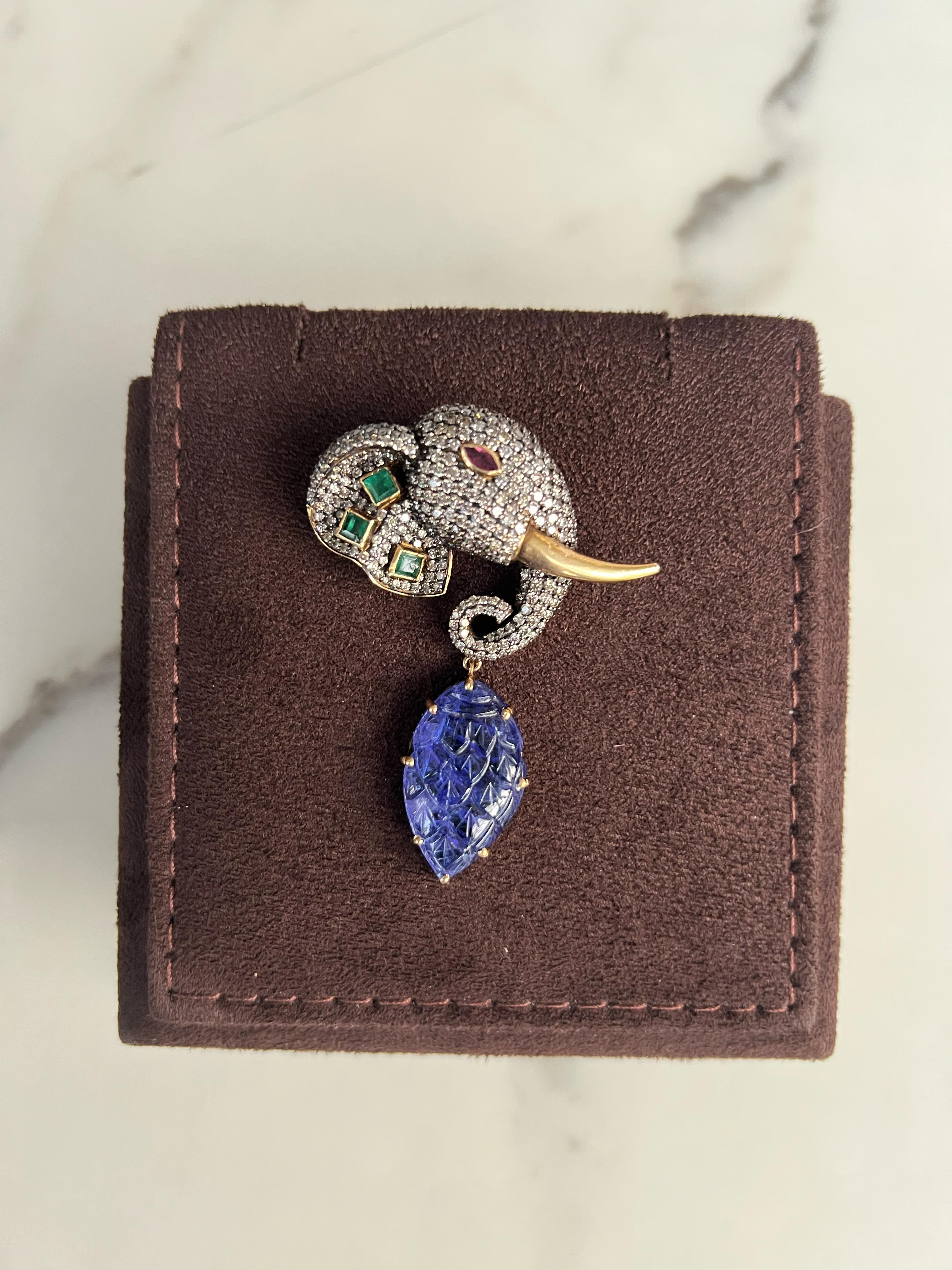 Carved Tanzanite elephant pendant/Brooch Carved Tanzanite elephant pendant/Brooch