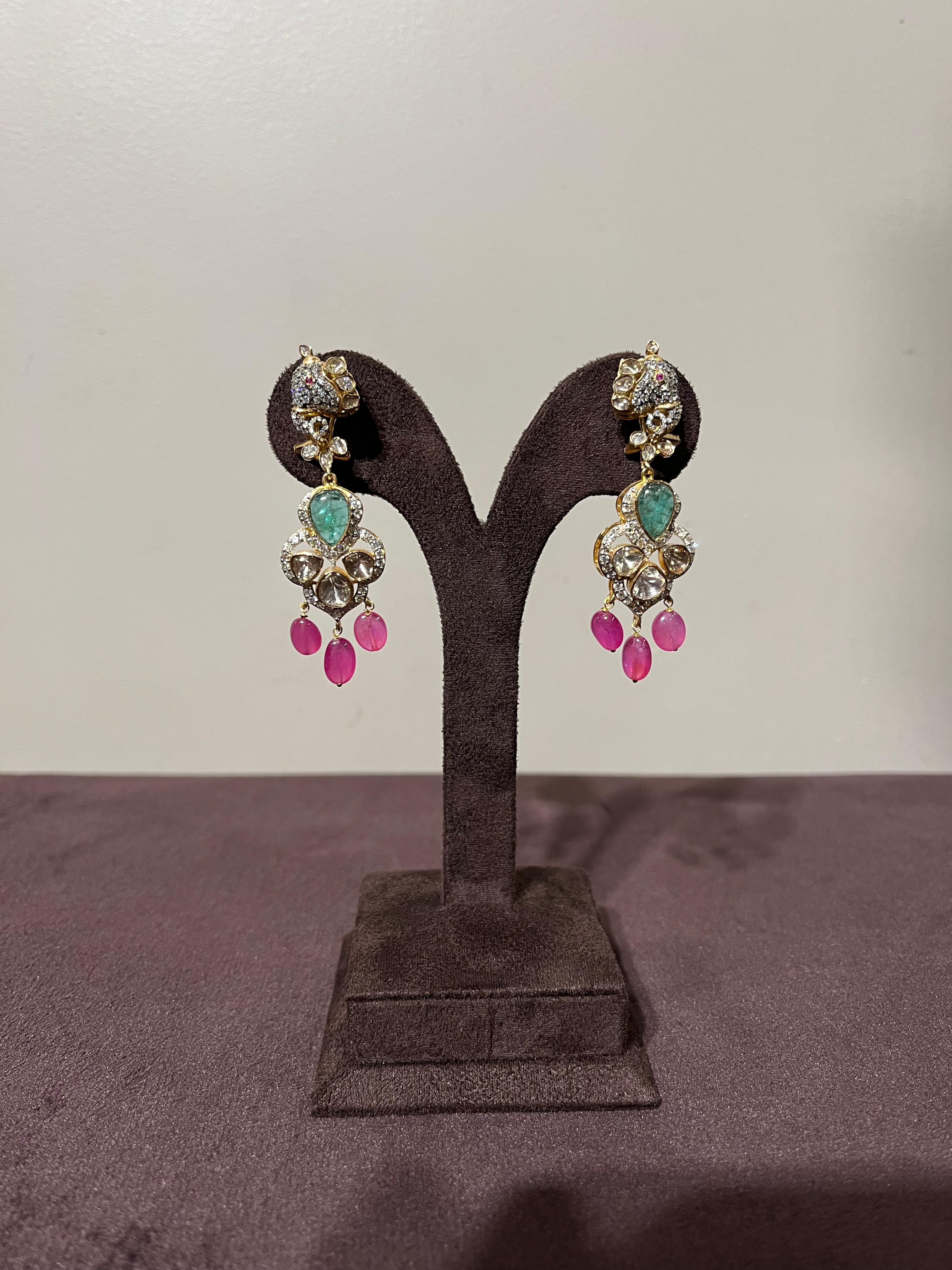Elephant Motif Polki Earrings Studded With Emerald and Ruby Beads