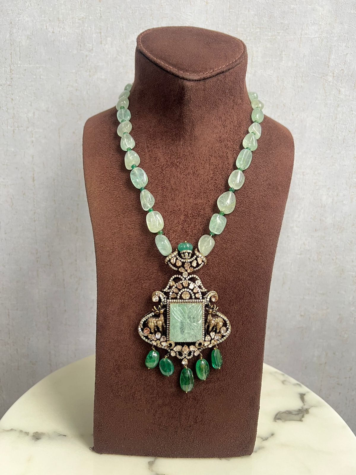 Reindeer motif victorian pendant with beryls